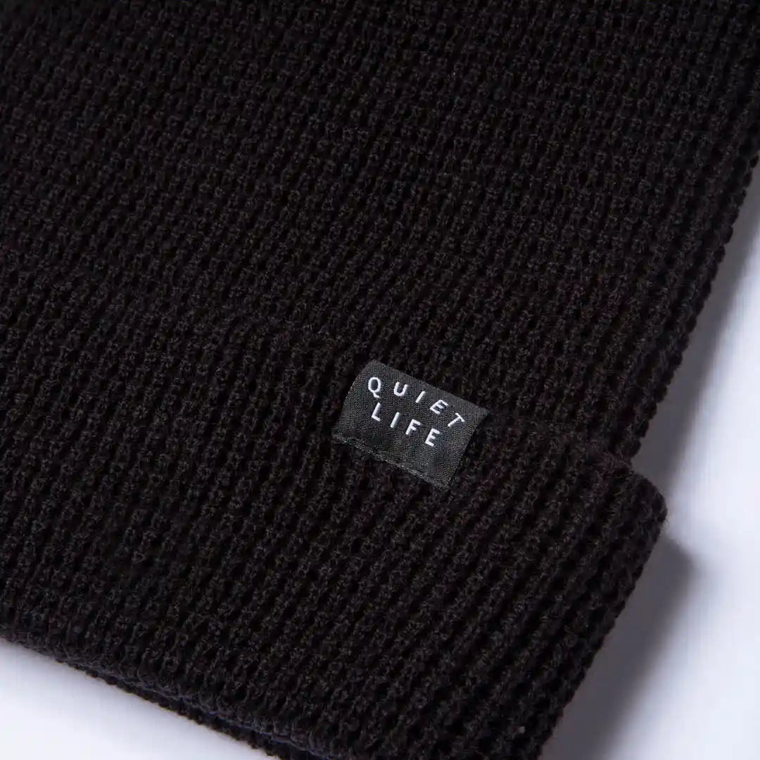 The Quiet Life Waffle Beanie, black — available at Norwood