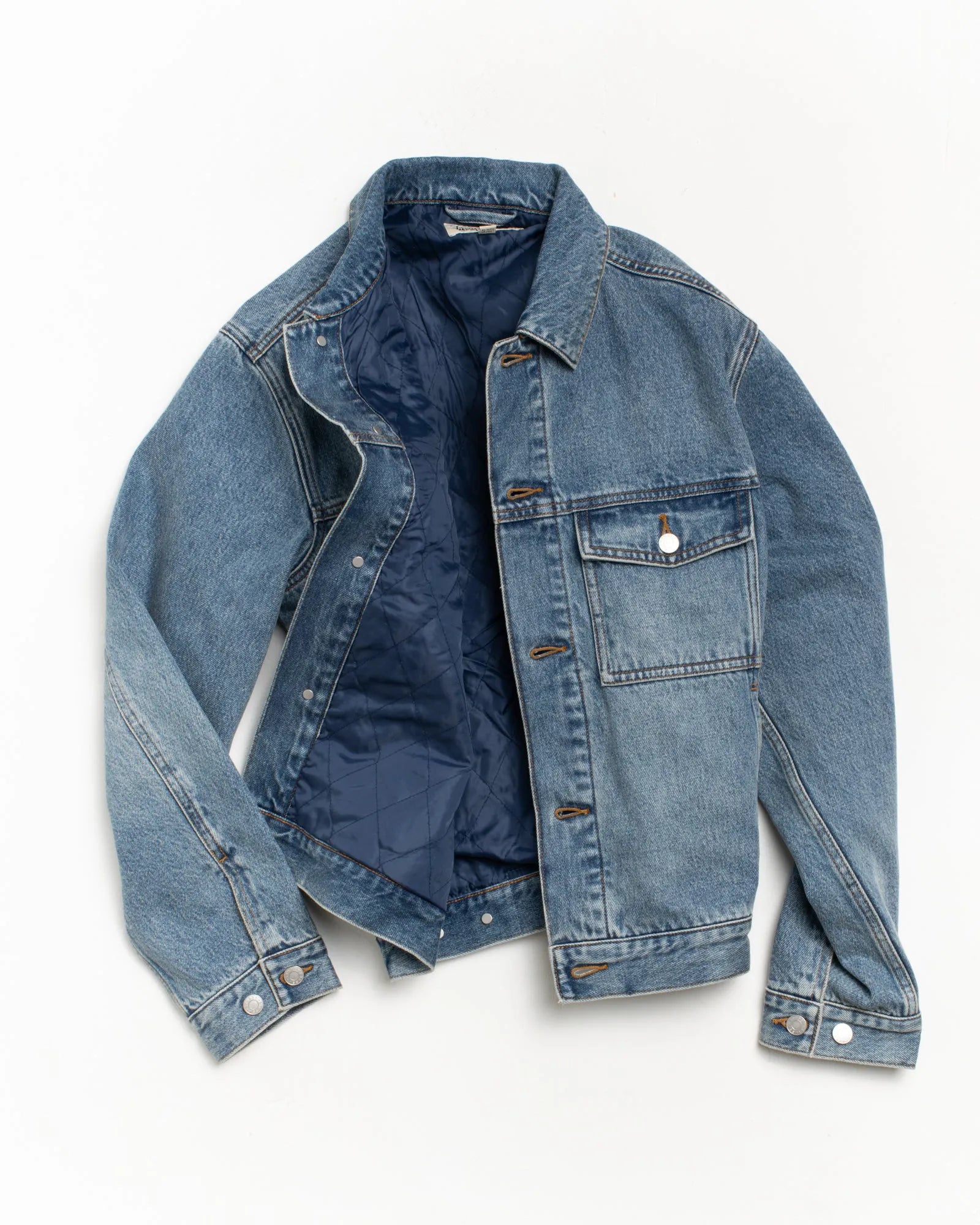 Stussy Lined Denim Trucker Jacket, indigo stone wash — available at Norwood
