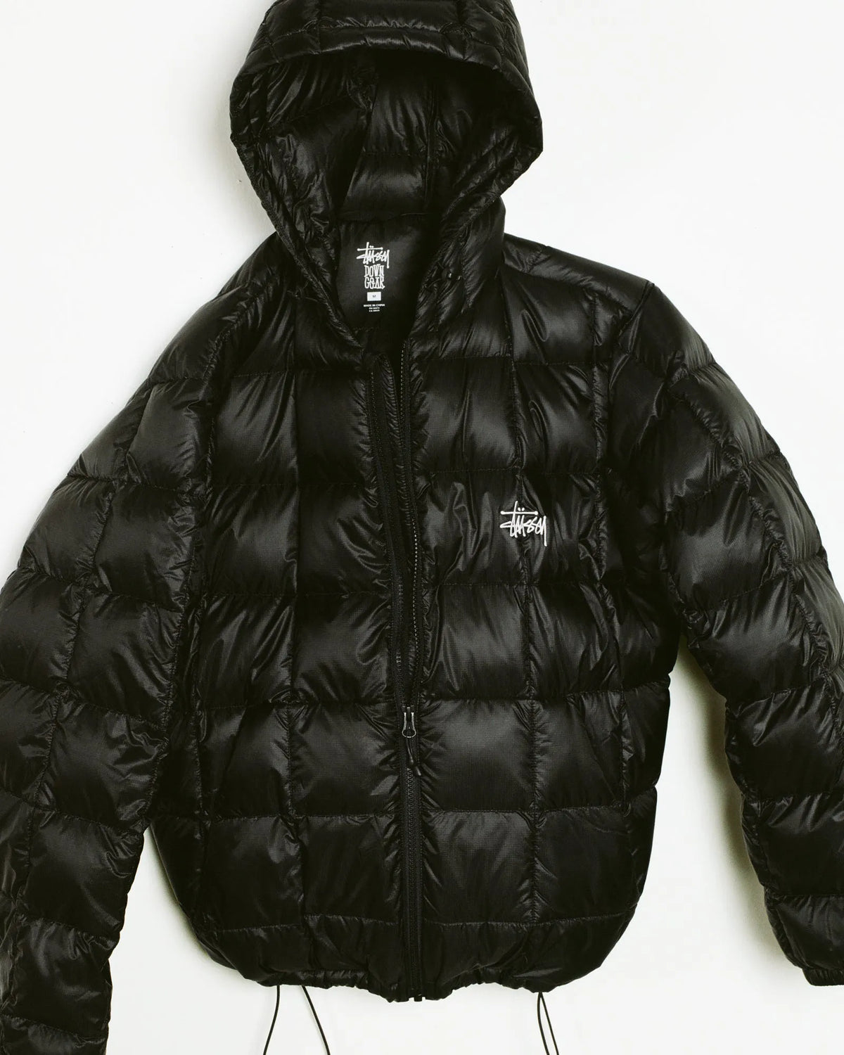 Stussy Midweight Hooded Puffer, black — available at Norwood
