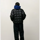 Stussy Midweight Puffer, black — available at Norwood