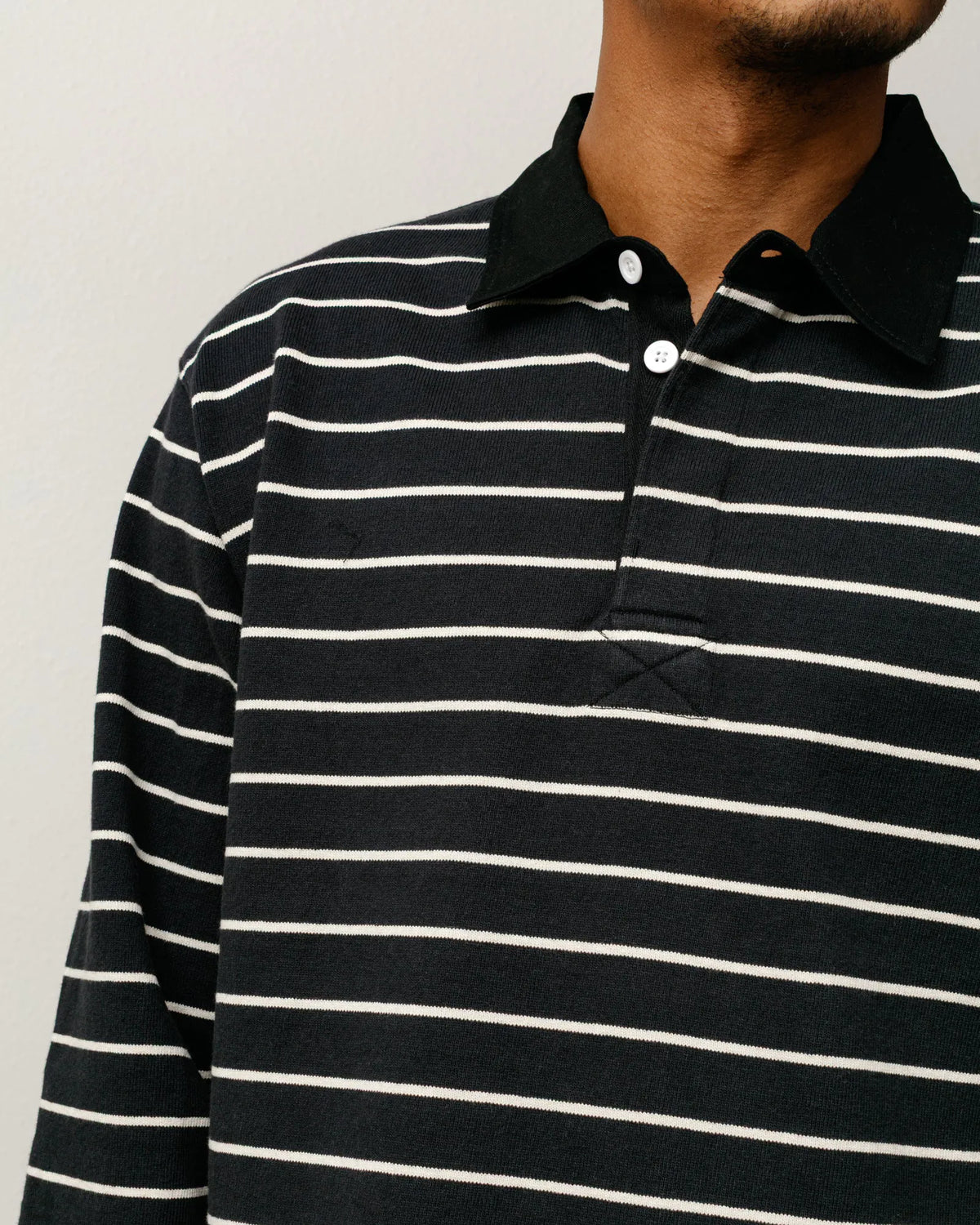 Stussy Pin Striped Rugby, black — available at Norwood