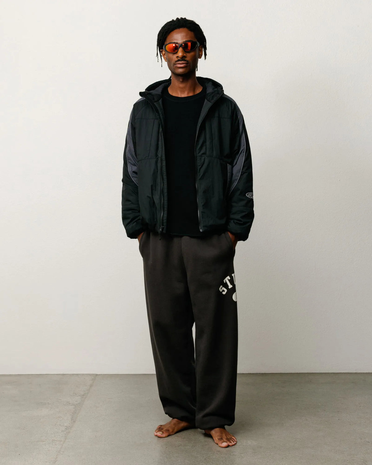 Stussy Varsity Fleece Pant, washed black — available at Norwood