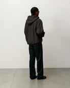 Stussy Varsity Zip Hood, washed black — available at Norwood
