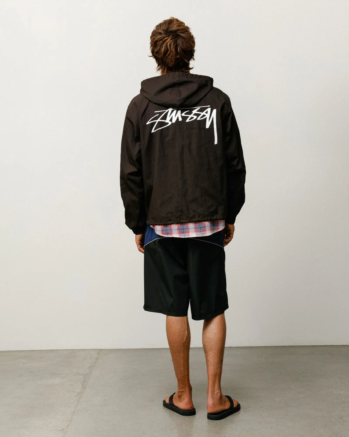 Stussy Waxed Cotton Beach Shell, brown — available at Norwood