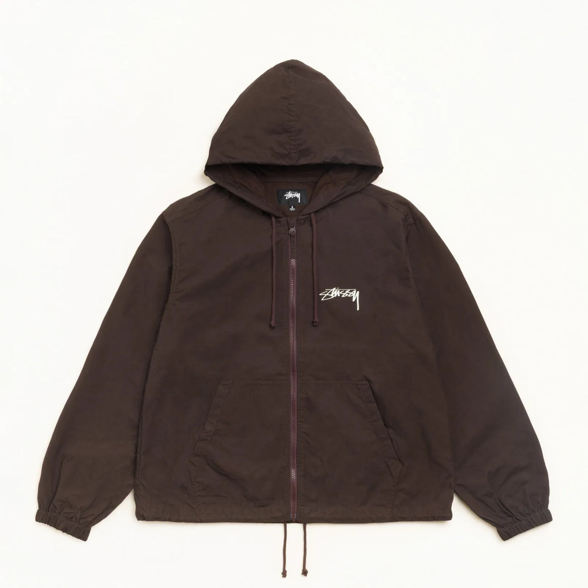 Stussy Waxed Cotton Beach Shell, brown — available at Norwood