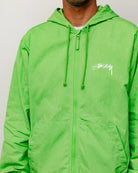 Stussy Waxed Cotton Beach Shell, kiwi — available at Norwood