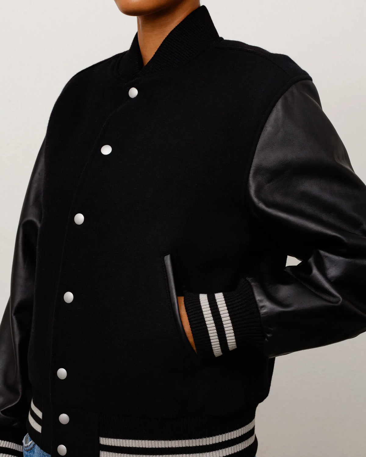 Stussy Wool Varsity, black — available at Norwood