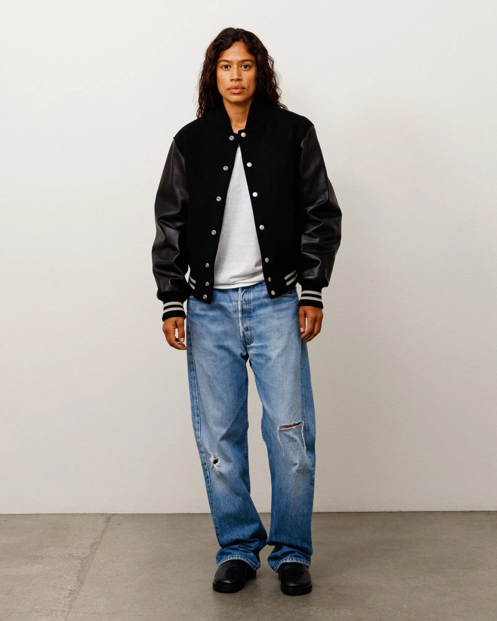 Stussy Wool Varsity, black — available at Norwood