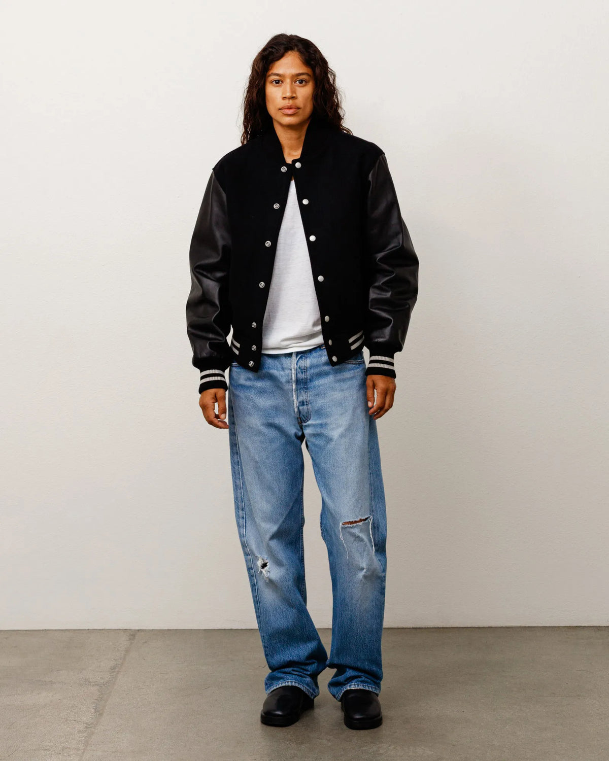 Stussy Wool Varsity, black — available at Norwood