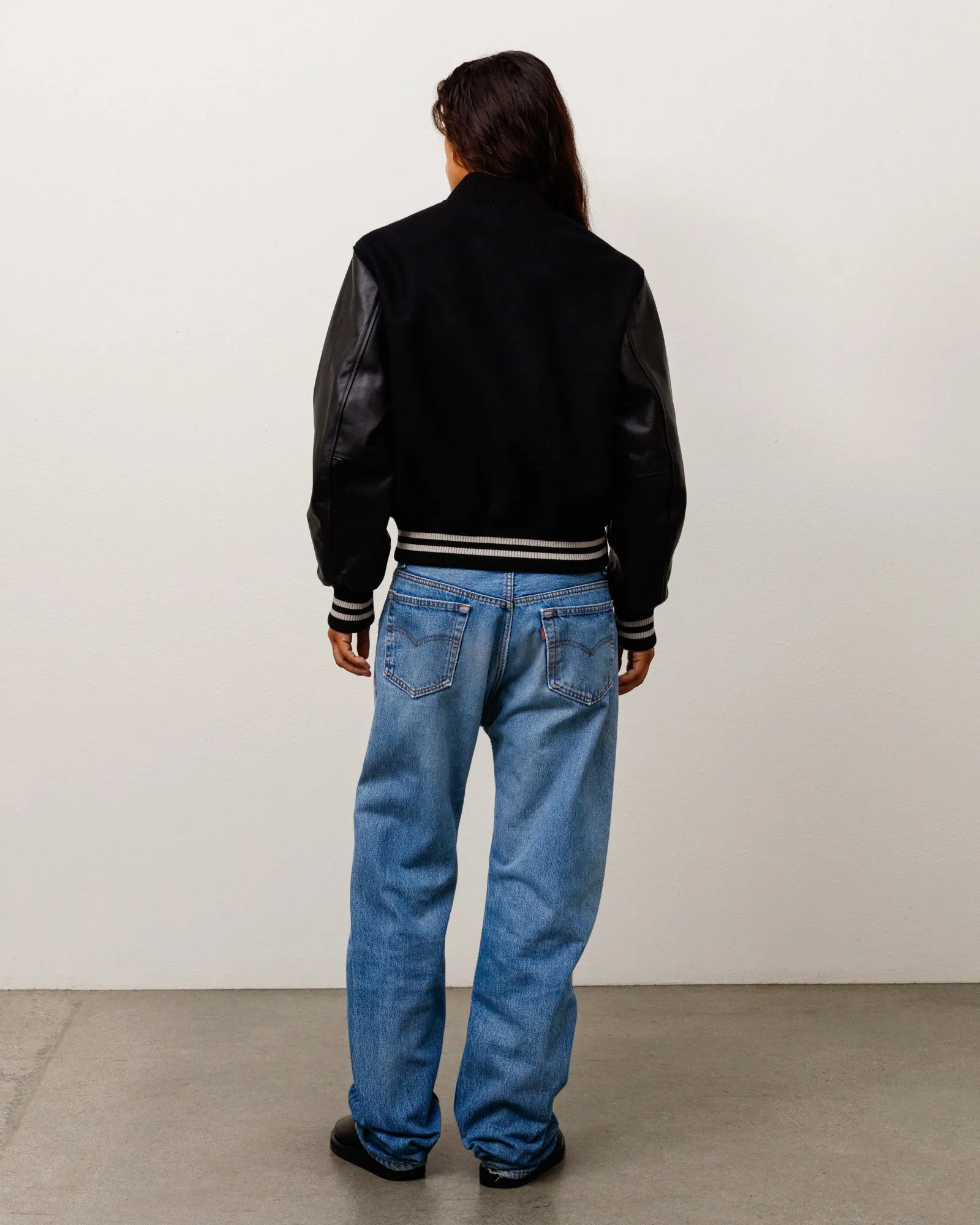 Stussy Wool Varsity, black — available at Norwood