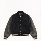Stussy Wool Varsity, black — available at Norwood