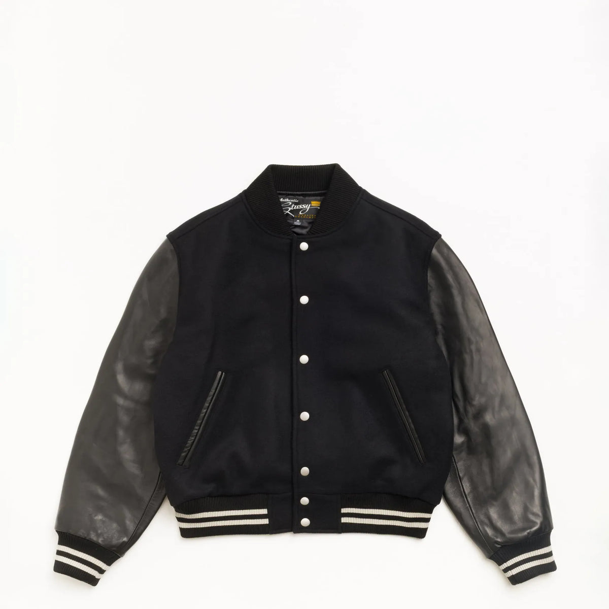 Stussy Wool Varsity, black — available at Norwood