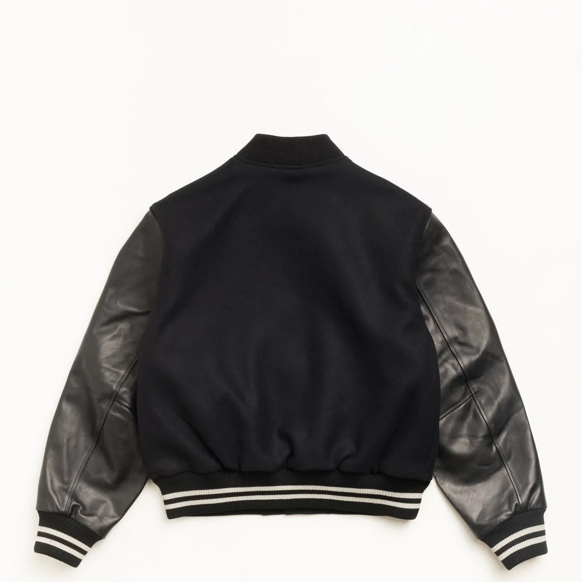 Stussy Wool Varsity, black — available at Norwood