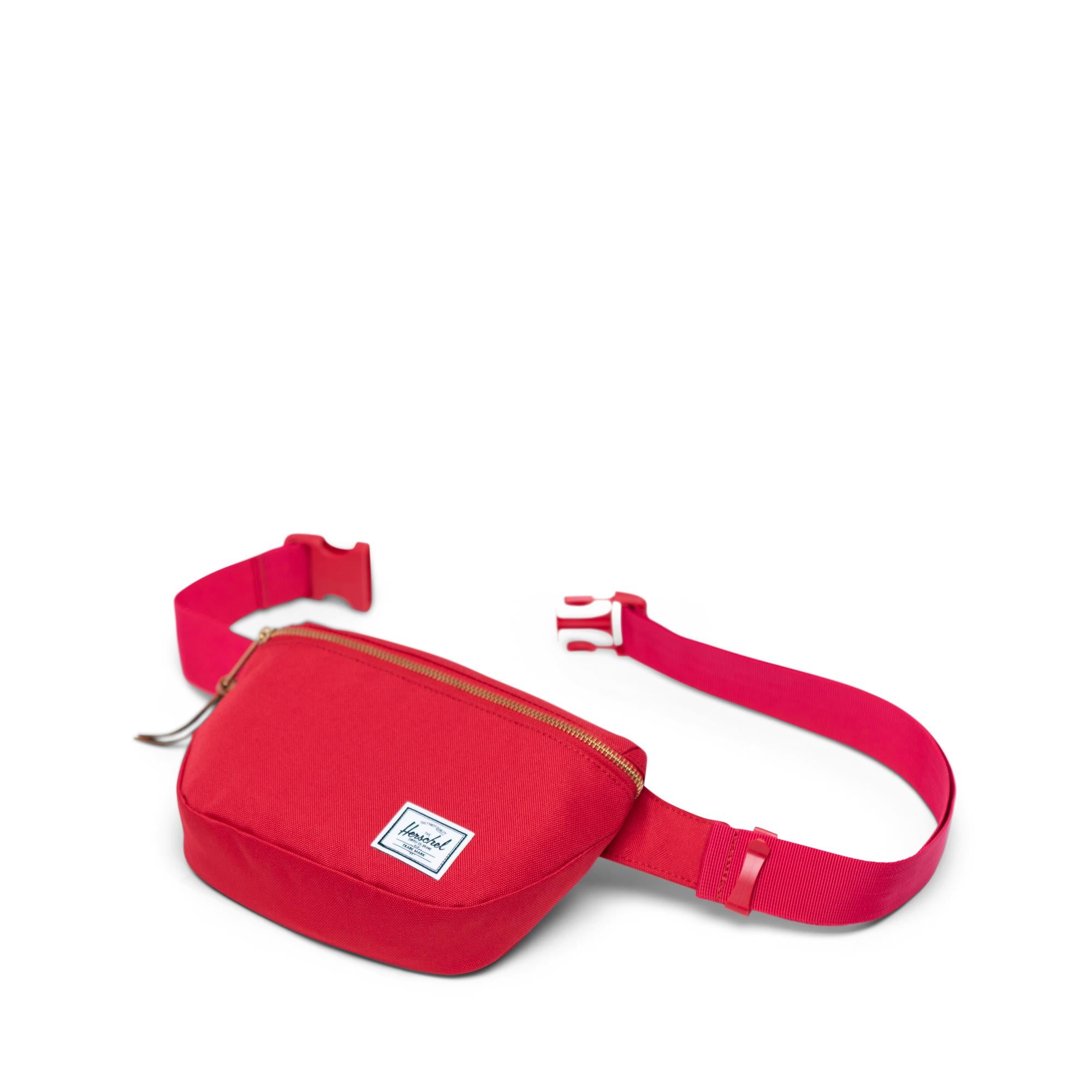 Herschel Fifteen Hip Pack, red — available at Norwood